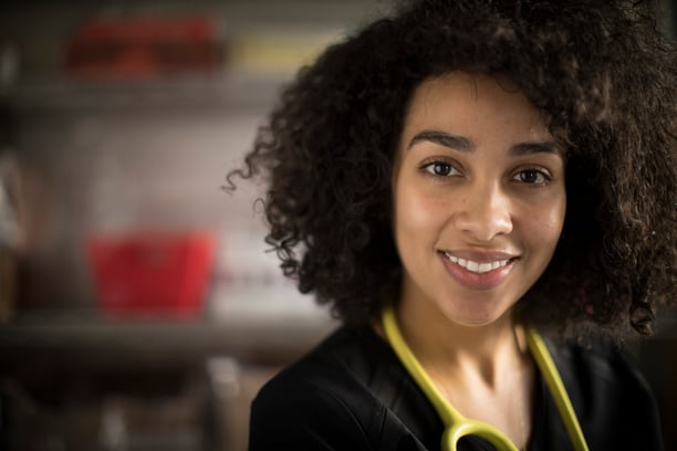 Student with stethoscope close up