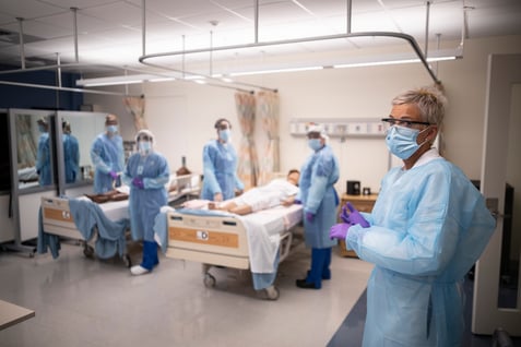 Students and instructor in Sim Lab in PPE