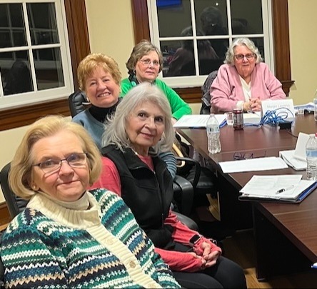 Alumni Council members at the March 2025 meeting. 5 women sitting at conference table.